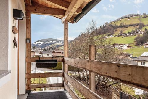 a view from the balcony of a house with a view at Bergwelt A2 in Niederau