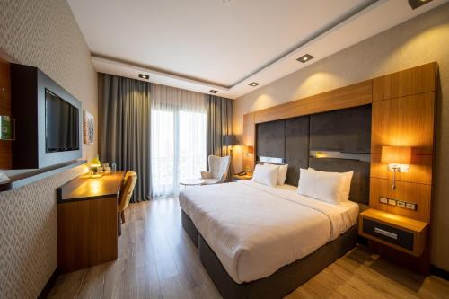 Ένα ή περισσότερα κρεβάτια σε δωμάτιο στο Holiday Inn - Trabzon-East by IHG