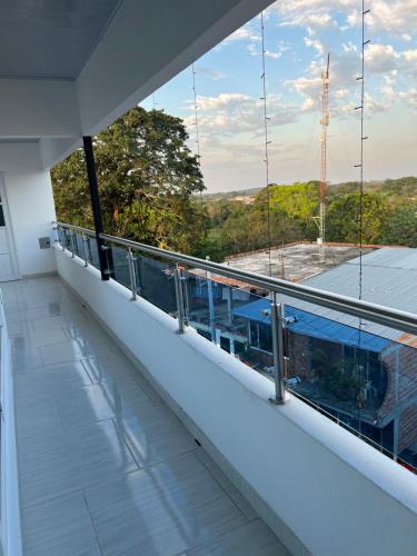 a balcony with a view of a building at TORRES DEL MESÓN LUXURY APARTA HOTEL Doradal in Doradal