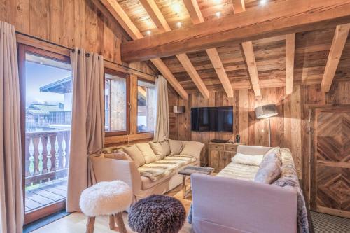 Televízia a/alebo spoločenská miestnosť v ubytovaní Chalet du Jaillet - Welkeys