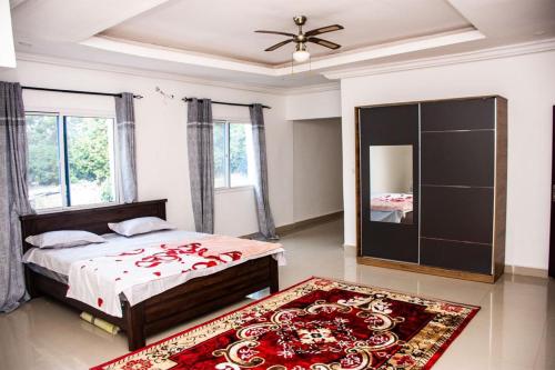 Кровать или кровати в номере Jobz Luxury Rental - White Villa