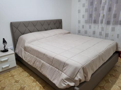 מיטה או מיטות בחדר ב-Casa da Carmine a Tursi