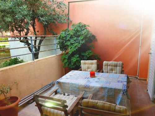 A balcony or terrace at Ilias' cosy and relaxing apartment