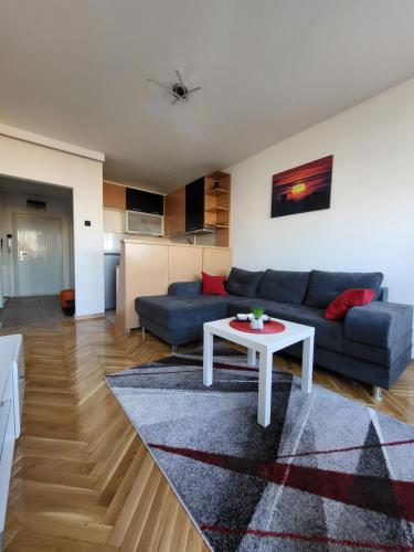Posezení v ubytování GREY apartment