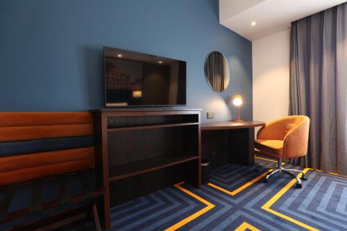 TV a/nebo společenská místnost v ubytování Holiday Inn Express & Suites Jaipur Gopalpura by IHG