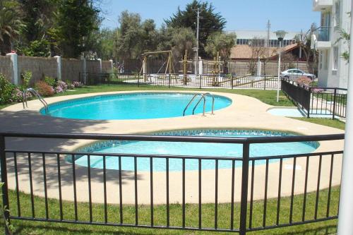 Bazén v ubytování Condominio Espacio Uno Fco de Aguirre nebo v jeho okolí