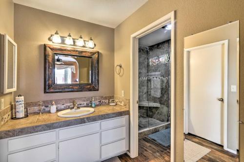 a bathroom with a sink and a shower at Bullhead City Home with Private Pool, Hot Tub and View in Bullhead City