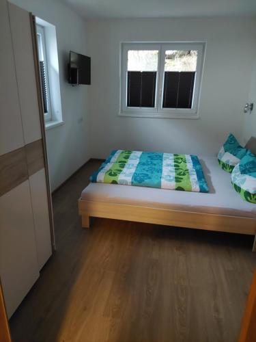 Postel nebo postele na pokoji v ubytování Appart Holzknecht