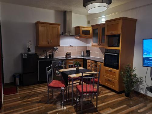 Kuchyňa alebo kuchynka v ubytovaní Appartement chaleureux à 35mn de Paris