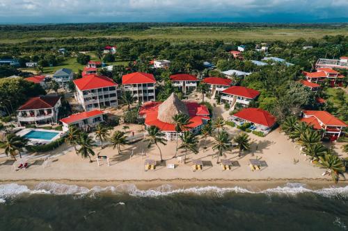 an aerial view of the resort and the beach at The Lodge at Jaguar Reef in Hopkins