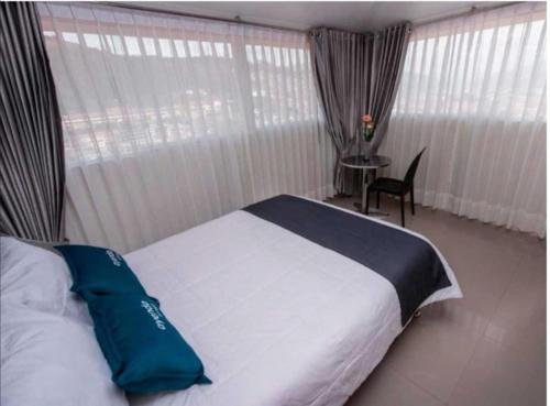 Postel nebo postele na pokoji v ubytování Hotel Luna de Oro Cusco