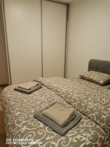 Postel nebo postele na pokoji v ubytování Apartman Stojanović
