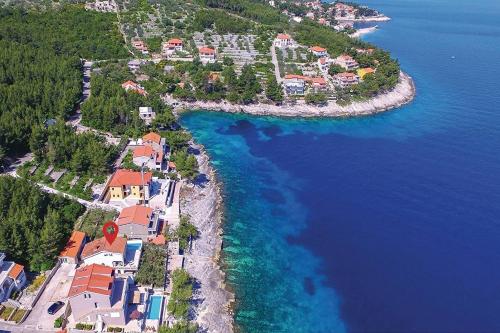 an aerial view of an island in the water at Vila Dream 1st row to the sea in Prigradica