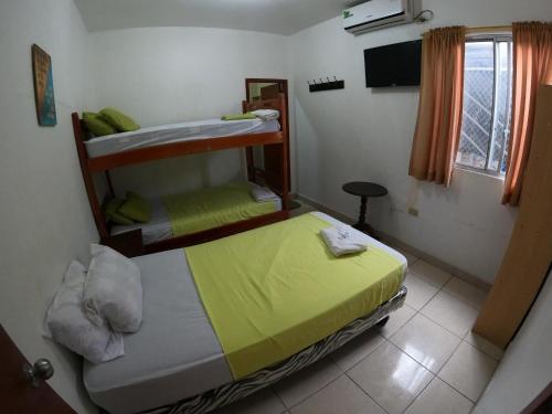 Hostal El Naufrago 1にあるベッド