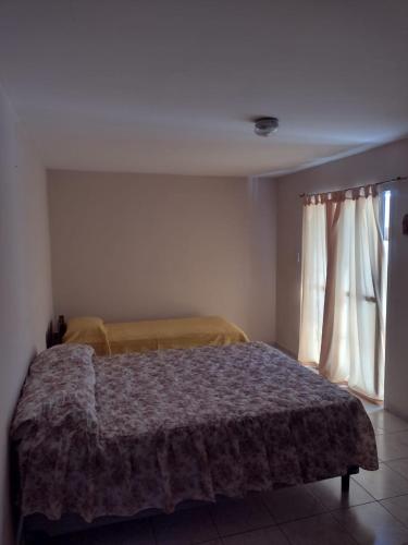 Una cama o camas en una habitación de SEGOVIA
