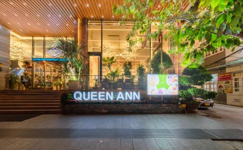 a queen am sign in front of a store at Queen Ann Nha Trang Hotel in Nha Trang