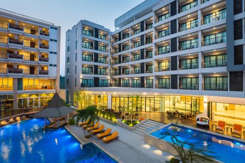 an image of a hotel with a swimming pool at J Inspired Hotel Pattaya in Pattaya