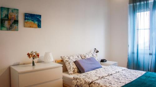 Una cama o camas en una habitación de Apartment Belem