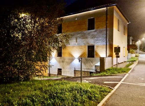 a building on the side of a street at night at Vila Vyšehrad in Český Krumlov