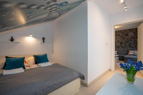 Posteľ alebo postele v izbe v ubytovaní Apartament Nad Potokiem 41