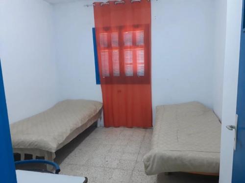 Кровать или кровати в номере Sidi Mansour Route Touristique