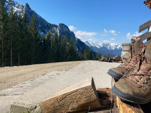 a pair of shoes sitting on top of a mountain at Hotel Casa Maria in Halblech
