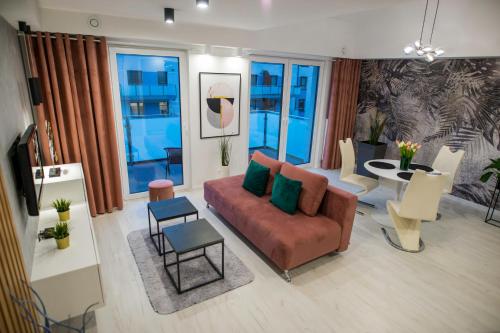 Posezení v ubytování Nowoczesny apartament na Warmii i Mazurach z garażem