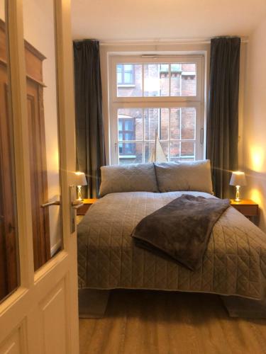 Voodi või voodid majutusasutuse Schöne FeWo im Zentrum von Wismar toas