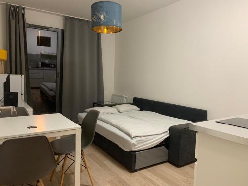 Кровать или кровати в номере Residence Port Karolina