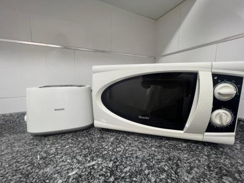 TV a/nebo společenská místnost v ubytování Central Prívate Room Valencia