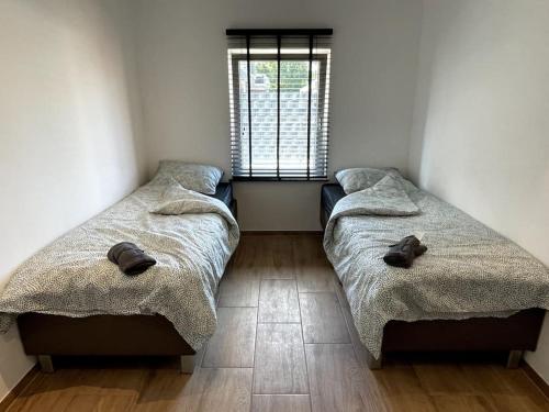 Postel nebo postele na pokoji v ubytování Comfortable Apartment