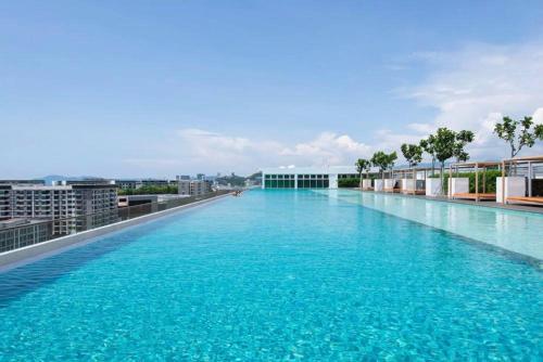 a large swimming pool on the roof of a building at SA Sutera Avenue Homestay Kota Kinabalu Area KK City Opposite Imago in Kota Kinabalu