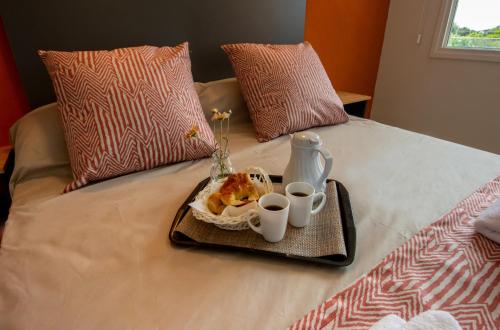 Ένα ή περισσότερα κρεβάτια σε δωμάτιο στο Farnese Apart & Spa - Farnese Apart Mar