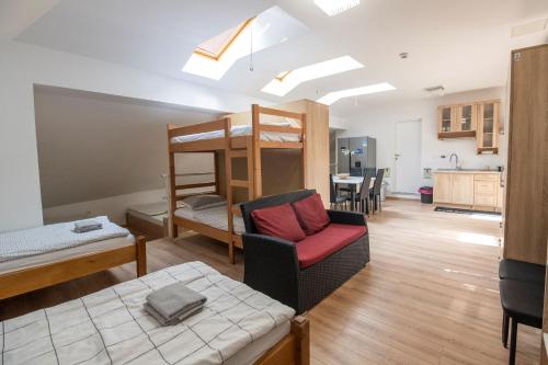 Postel nebo postele na pokoji v ubytování Hostel Vojnik