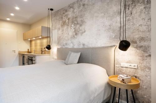 Ένα ή περισσότερα κρεβάτια σε δωμάτιο στο My Suite Leesch - Hotel & Restaurant nahe Büsum - Hunde herzlich willkommen