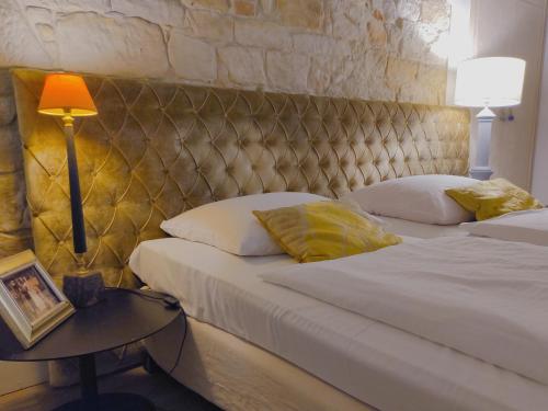 Ένα ή περισσότερα κρεβάτια σε δωμάτιο στο Villa Toscana Luxury Loft Agroturystyka