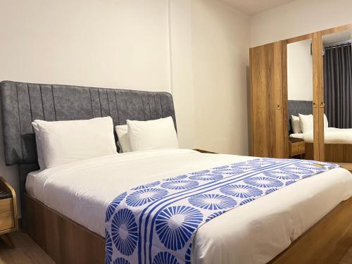 Postel nebo postele na pokoji v ubytování Sierra Palms Resort