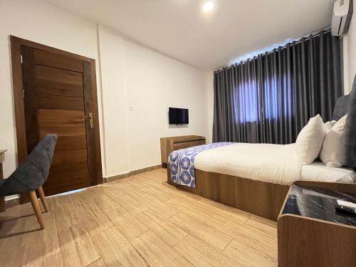 Postel nebo postele na pokoji v ubytování Sierra Palms Resort