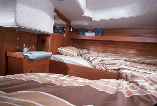 Postel nebo postele na pokoji v ubytování Agriturismo L'Aglientu B&B