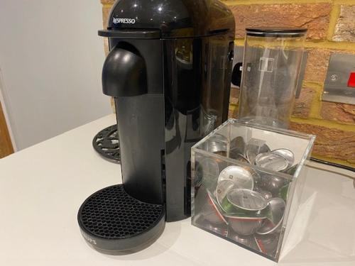a coffee maker sitting on a counter next to a container at Superfast WiFi studio, bathroom & own entrance in Brighton & Hove