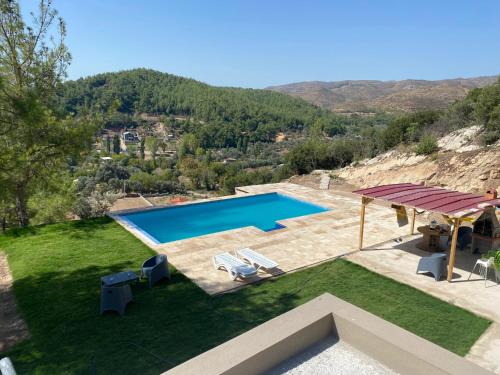 Kép Lovely Stonehouse with Pool and Backyard in Izmir szállásáról Gaziemirben a galériában