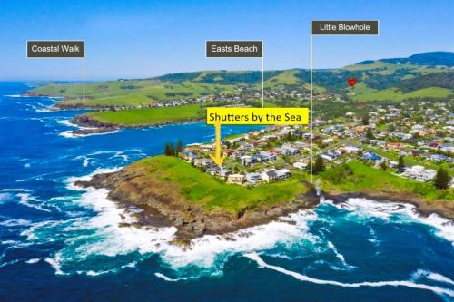 a view of an island in the ocean with a resort at Shutters by the Sea-Oceanfront-Sea views-Private retreat for 2 in Kiama