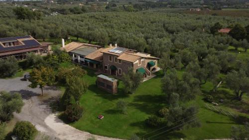 an aerial view of a large house in a field at Agriturismo I Due Casali in Vetralla
