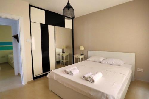 Katil atau katil-katil dalam bilik di Caesar Beach Villas and Apartments