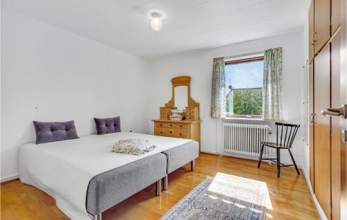 Llit o llits en una habitació de 3 Bedroom Awesome Home In Hjrring