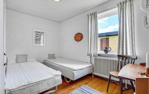 Postel nebo postele na pokoji v ubytování 3 Bedroom Lovely Home In Hjørring