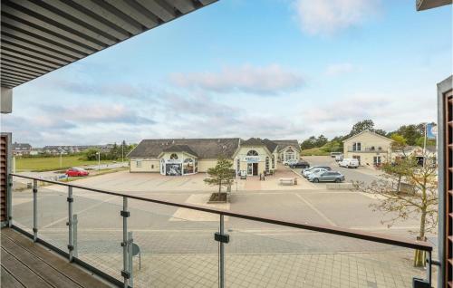 a balcony with a view of a parking lot at One-Bedroom Apartment In Romo in Havneby