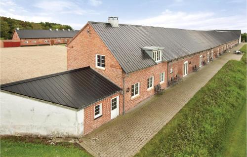 an overhead view of a large red brick building at Lønborggaard in Hemmet