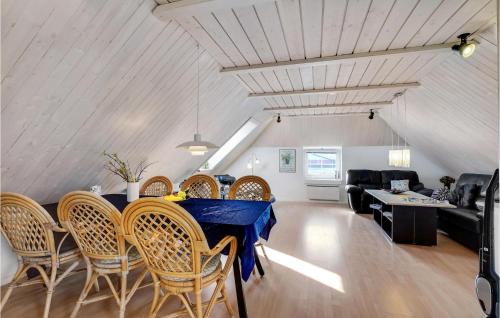 a dining room with a table and chairs at Stunning Apartment In Thisted With Wifi in Thisted
