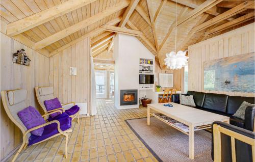 TV a/nebo společenská místnost v ubytování Holiday Home Tulipanvej Fjerritslev I